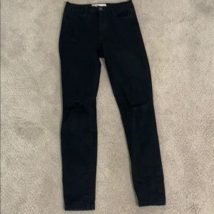 Garage black skinny jeans with knee rips high rise
